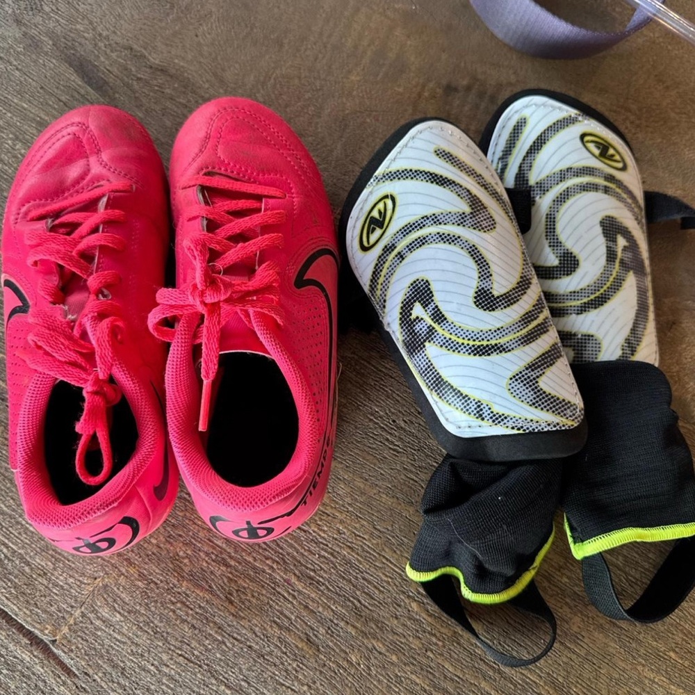 Pink Soccer Cleats and White Shin Guards
